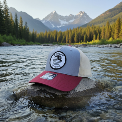 Grey Cardinal Birch Hat on River Background