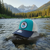Teal Navy Hat on Montana Riverbank